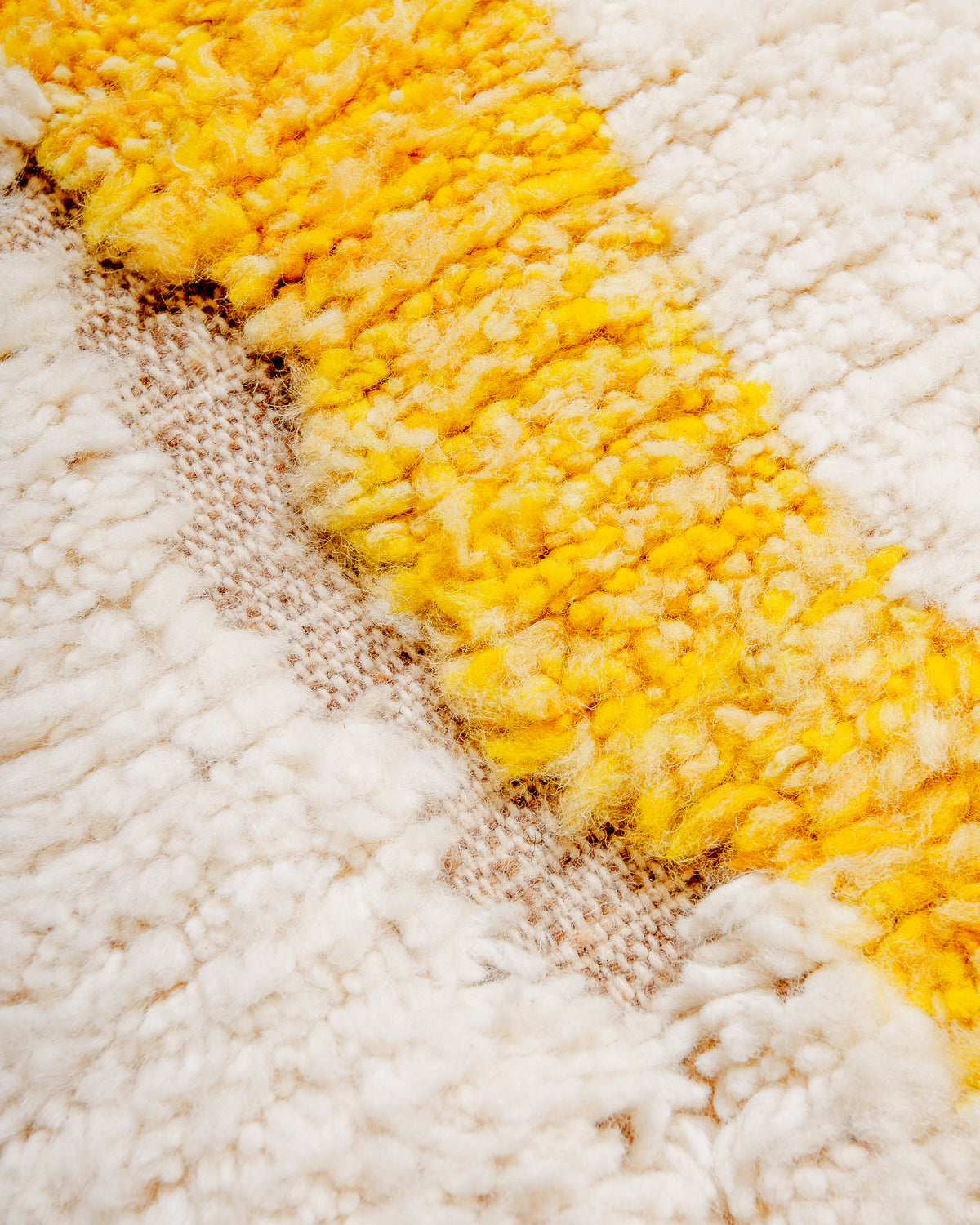 Modern, designer, handcrafted Berber rug from Morocco. Beniourain carpet with beautiful colours and patterns and fluffy wool texture.